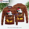 Grinch Holding Football Washington Commanders Ugly Xmas Sweater